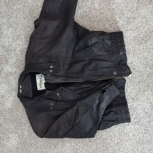 Wilson's large leather jacket